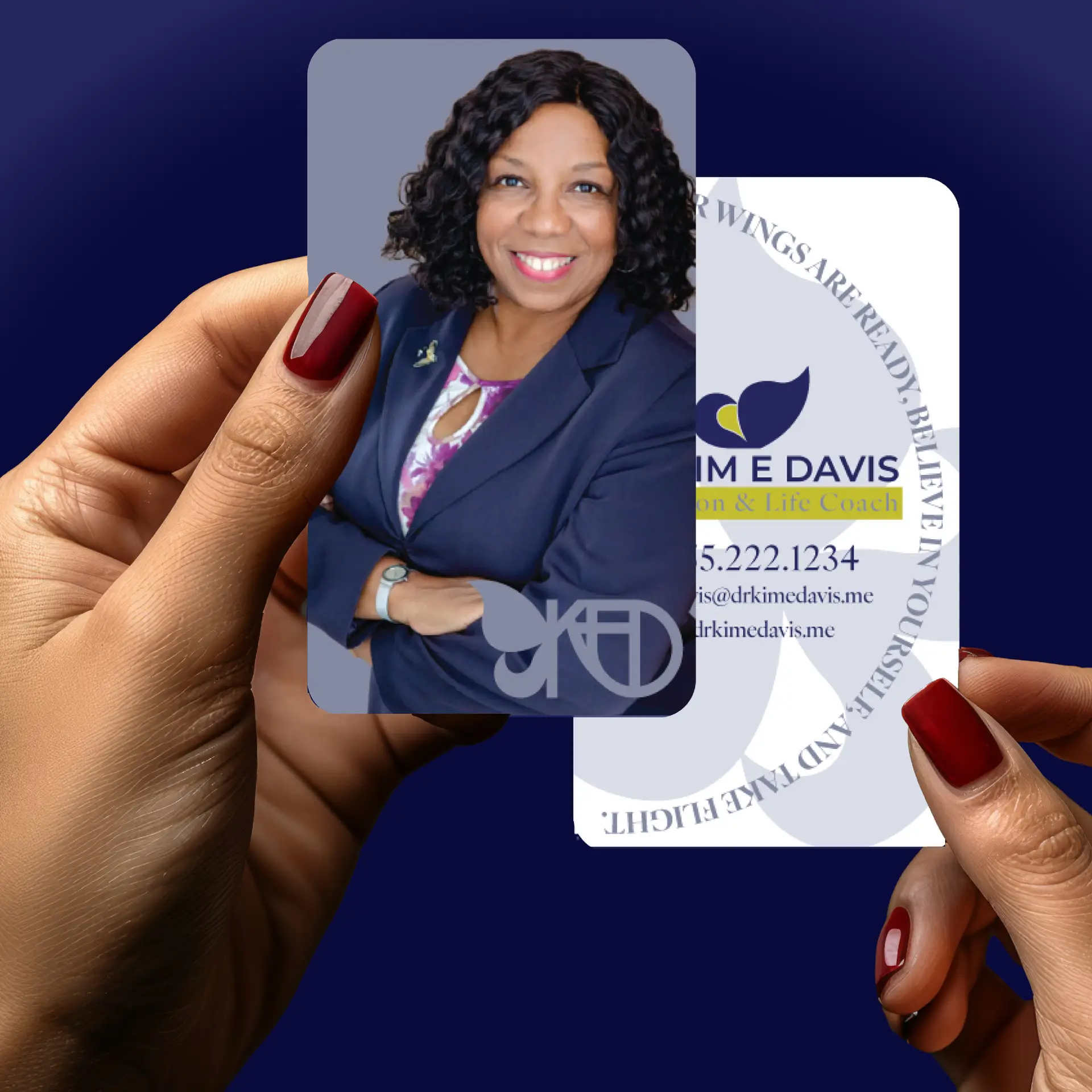 Hands holding business card design front and back client Dr Kim E Davis